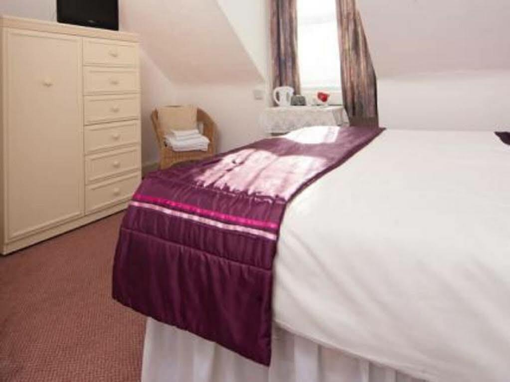 Sandy Bay Guest House Bournemouth Esterno foto